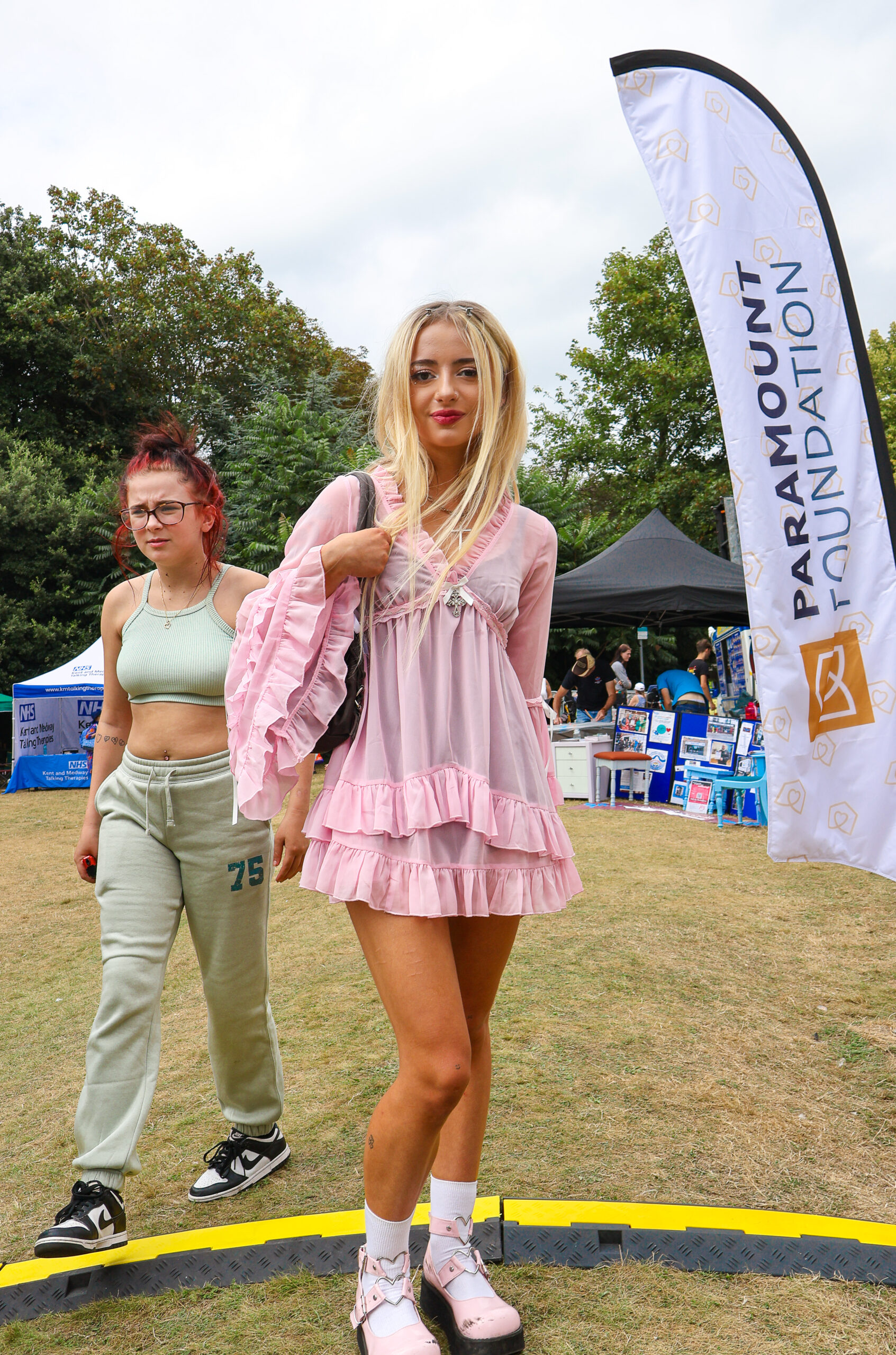 Young women pose for photo at the Sticks N Stones Festival in Medway Kent